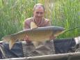 Frits met een graskarper van 16 pond